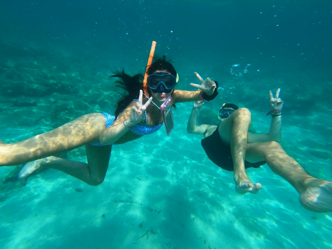 Couple enjoying  a private snorkel tour in ibiza
